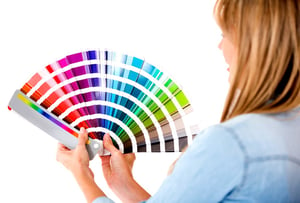 Designer holding color options for a new home
