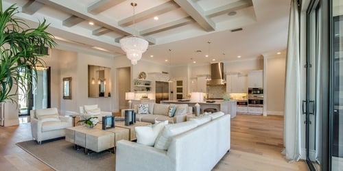 an open concept floorplan in a furnished home