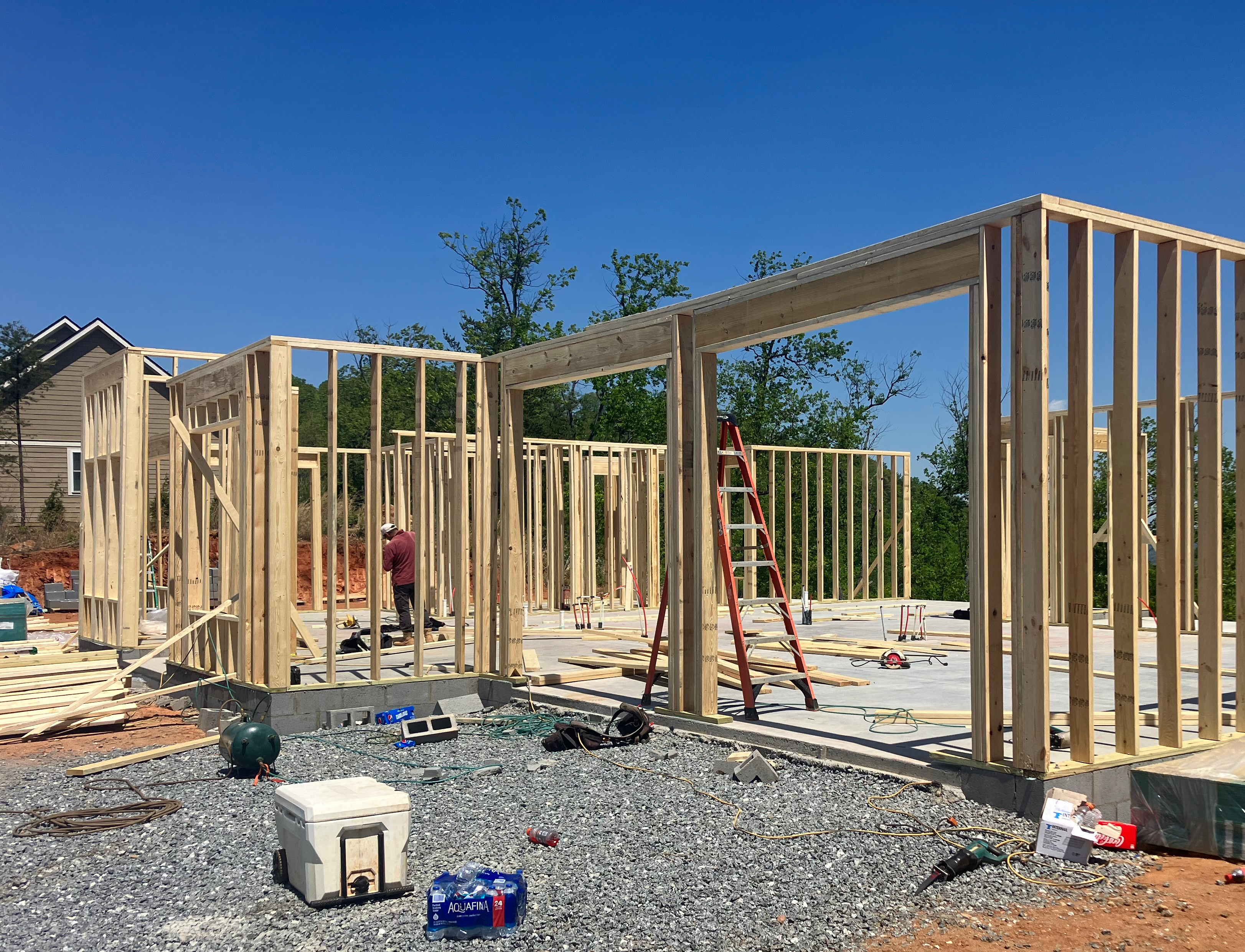 A house under construction with all the framing built.