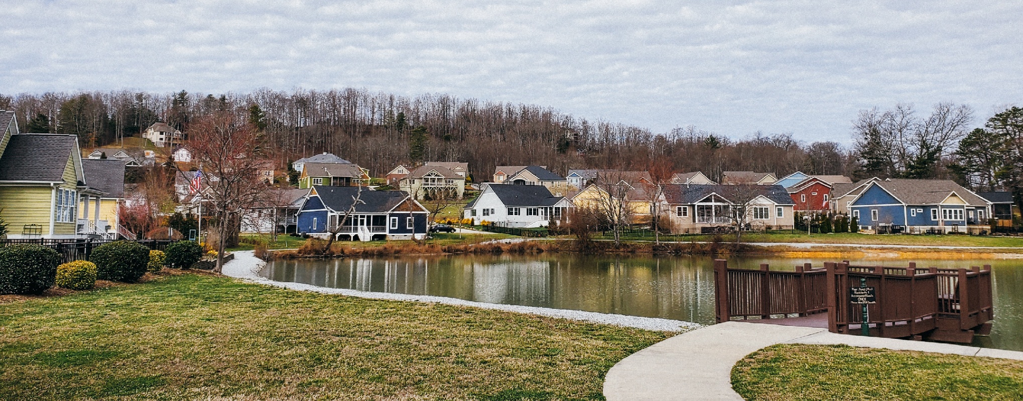 A community of homes in the hills of Western North Carolina. There is a water feature in the surrounding area.